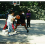 Youth Playing Basketball